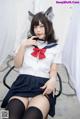 Coser@白烨 Vol.047: 魅惑狼姐姐-室外 (63 photos )